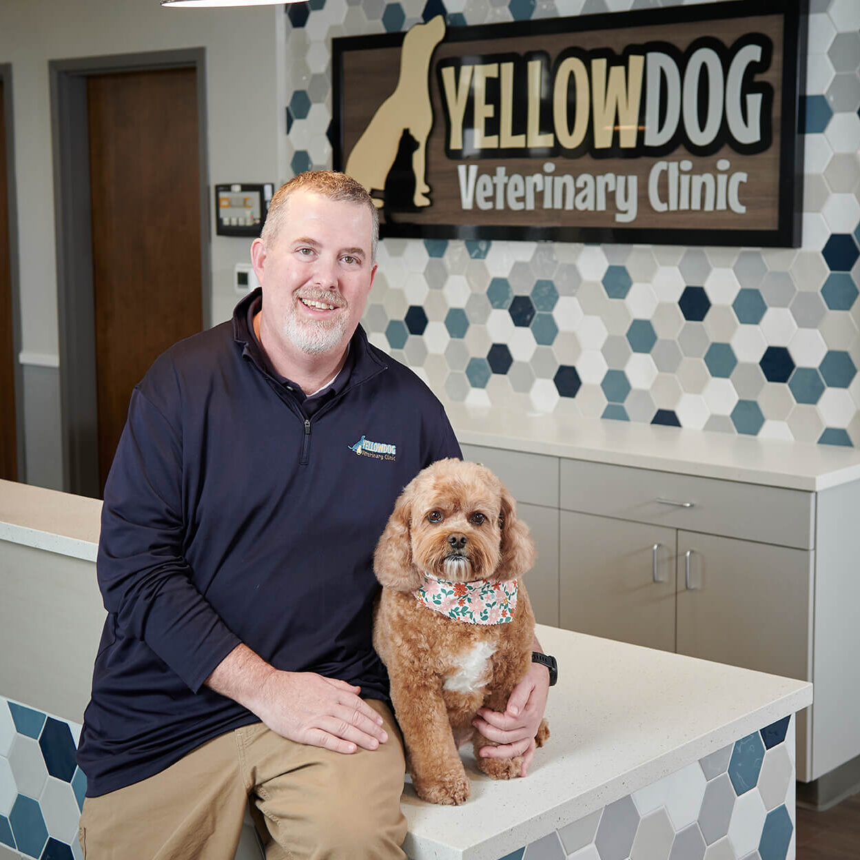 Dr Stanley With Dog At Front Desk